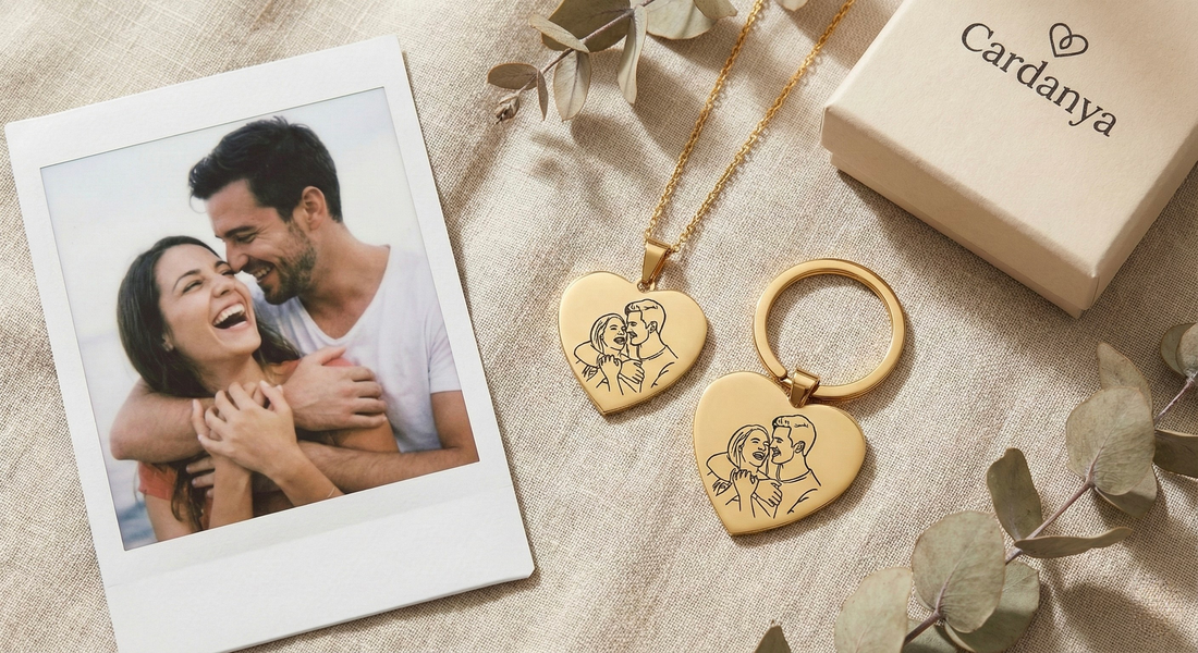 Cardanya 'The Eternal Bond Bundle' featuring a gold heart necklace and matching heart keychain with custom line art engraving, next to the original polaroid and gift box.